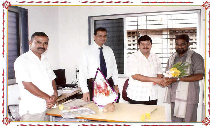 felicitation of Mr.Borade. Manager BOI.